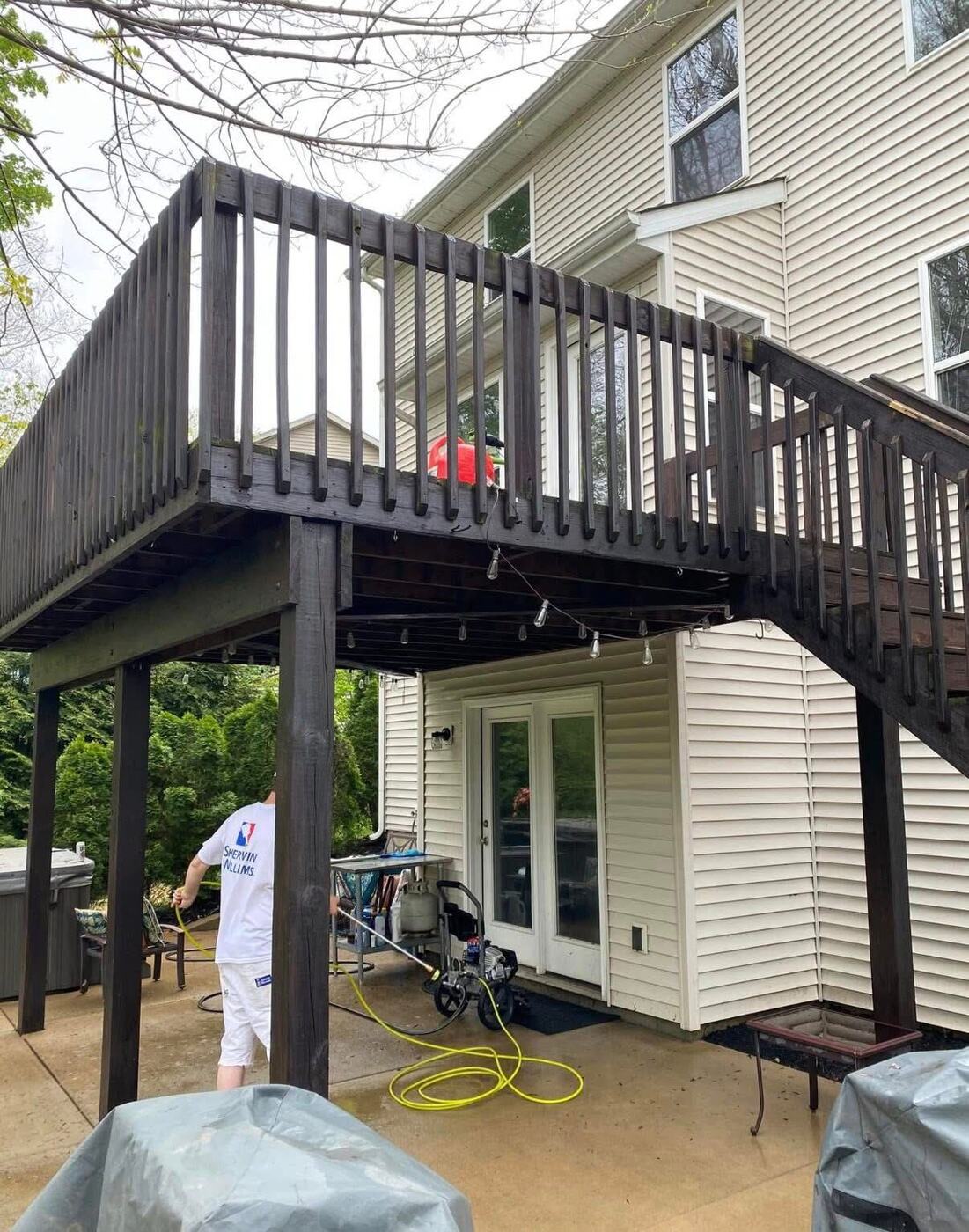 Elevated deck and staircase stained dark brown